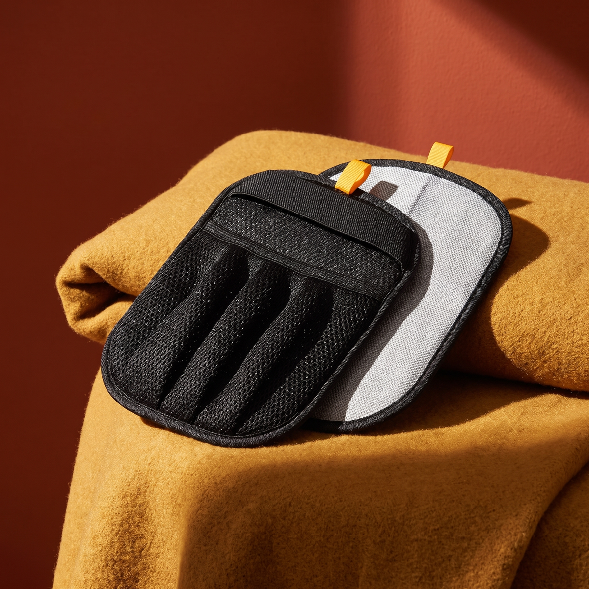 Pet grooming gloves styled in colour